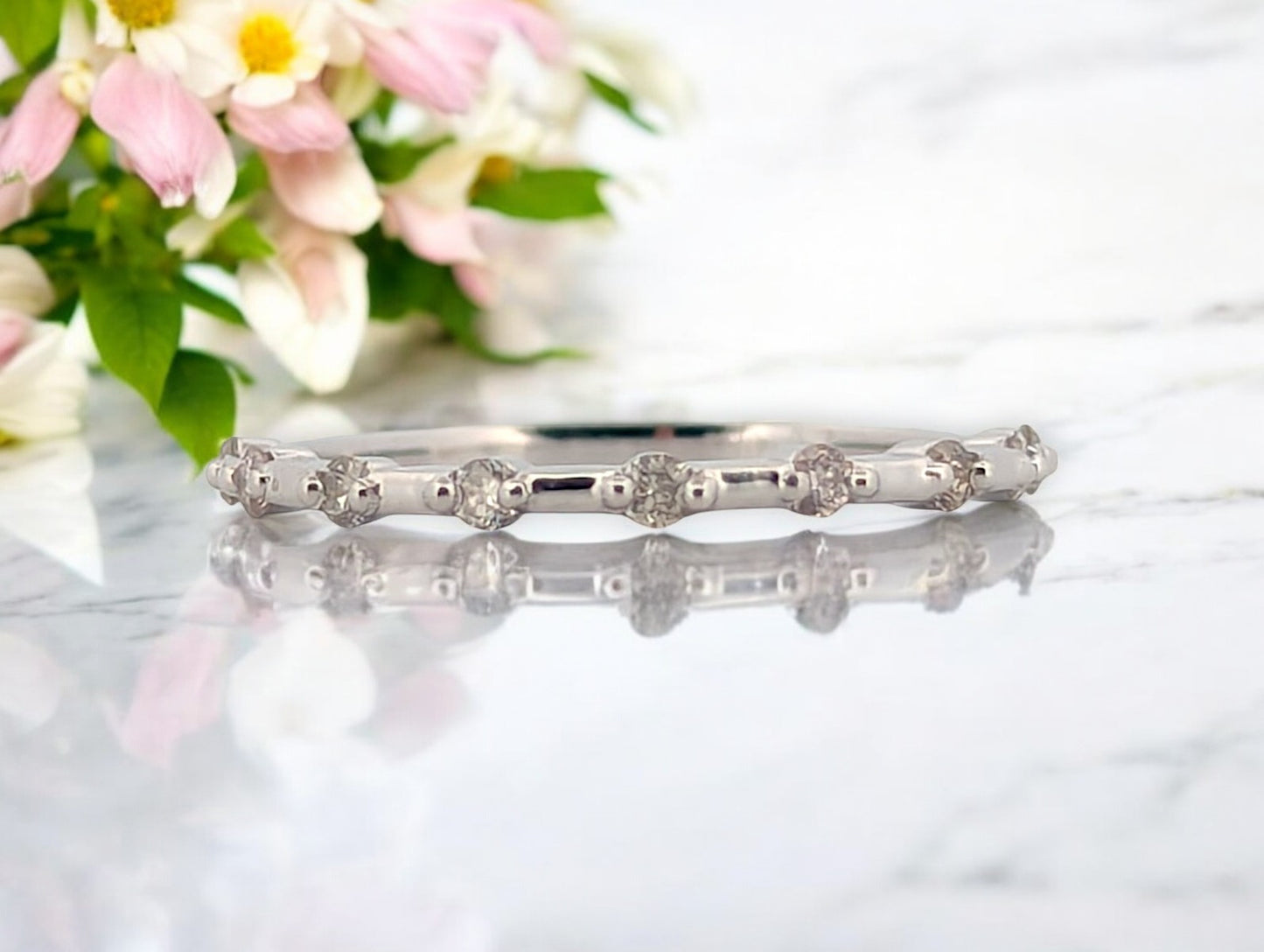 10k white gold band ring with .20 carat total weight natural diamonds