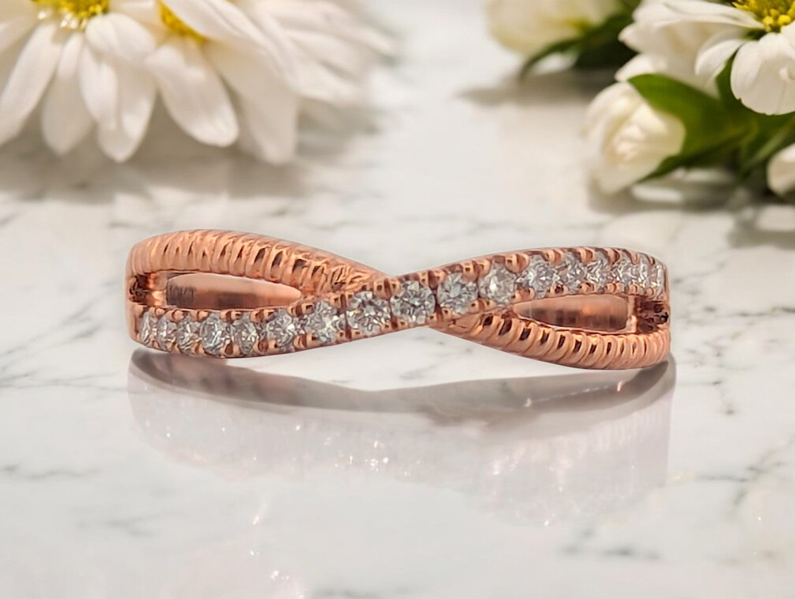 10k rose gold ring with .25 carat total weight natural diamonds