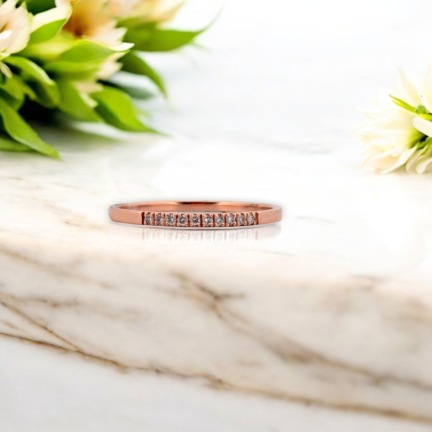 10k rose gold ring with .06 carat total weight natural diamonds