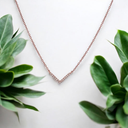 10k rose gold chevron necklace with .05 carat total weight diamonds and adjustable chain 14 to 18 inches