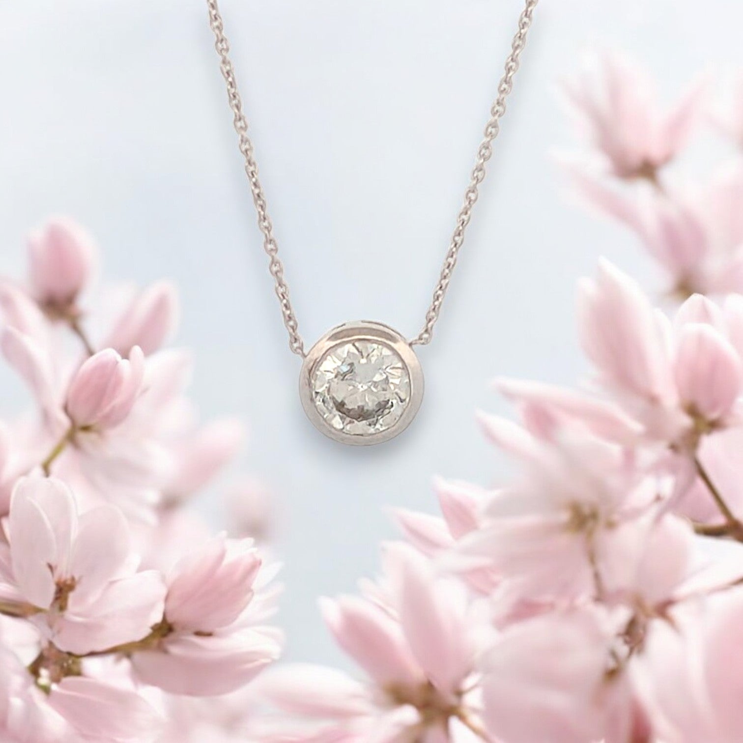 14k white gold necklace with 1.50 ctw bezel set lab diamond on adjustable 16"-18" chain