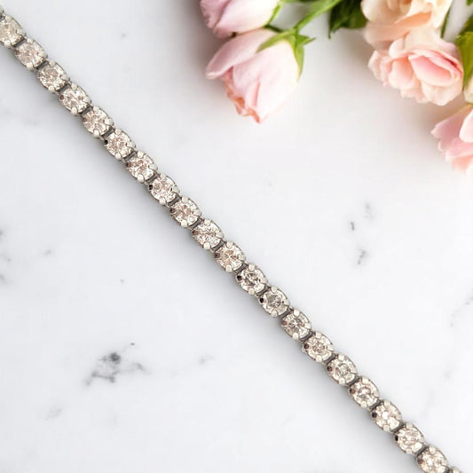 14k white gold tennis bracelet with natural round diamonds