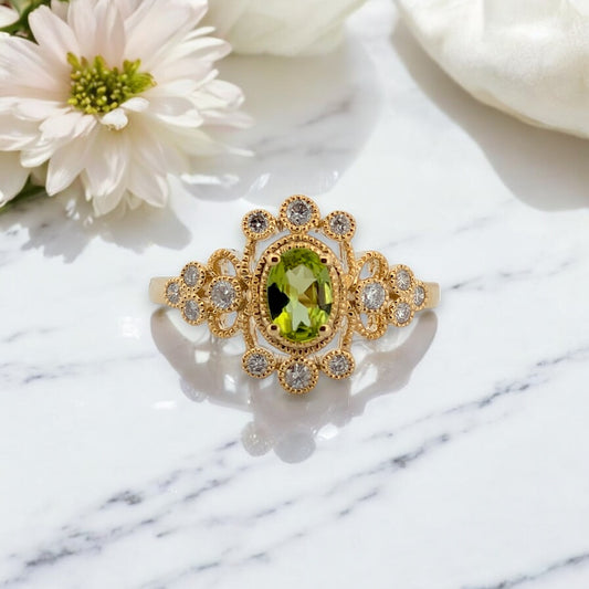 10k yellow gold ring with oval Peridot center and round Diamond halo