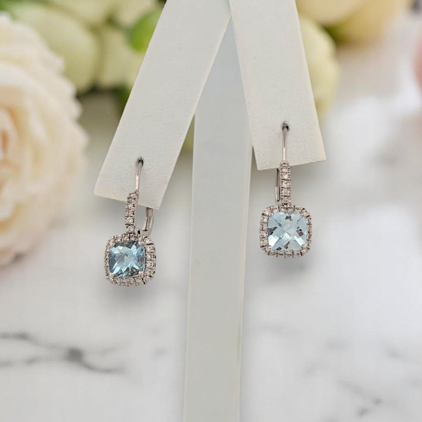 10k white gold leverback earrings with checkerboard cut aquamarines and natural diamonds