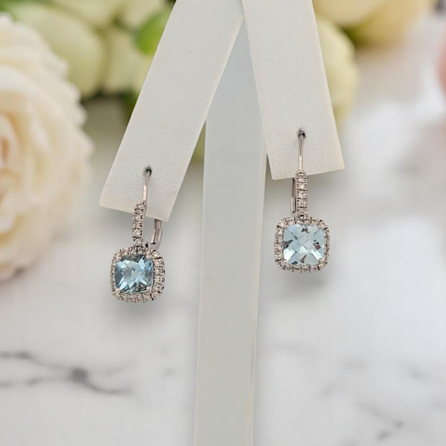 10k white gold leverback earrings with checkerboard cut aquamarines and natural diamonds
