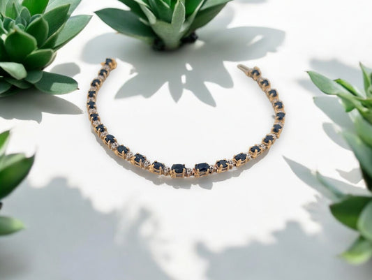 10k yellow gold bracelet with 3.80 carat natural Sapphires and .03 carat Diamonds