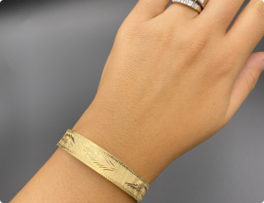 The Le Mans: Vintage Yellow Gold bangle bracelet with Diamond Cut Pattern