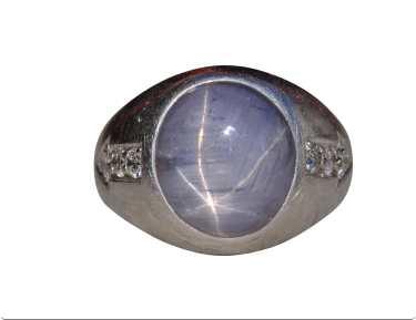 The Gooma: Art Deco Era Star Sapphire Ring with Diamonds in Platinum